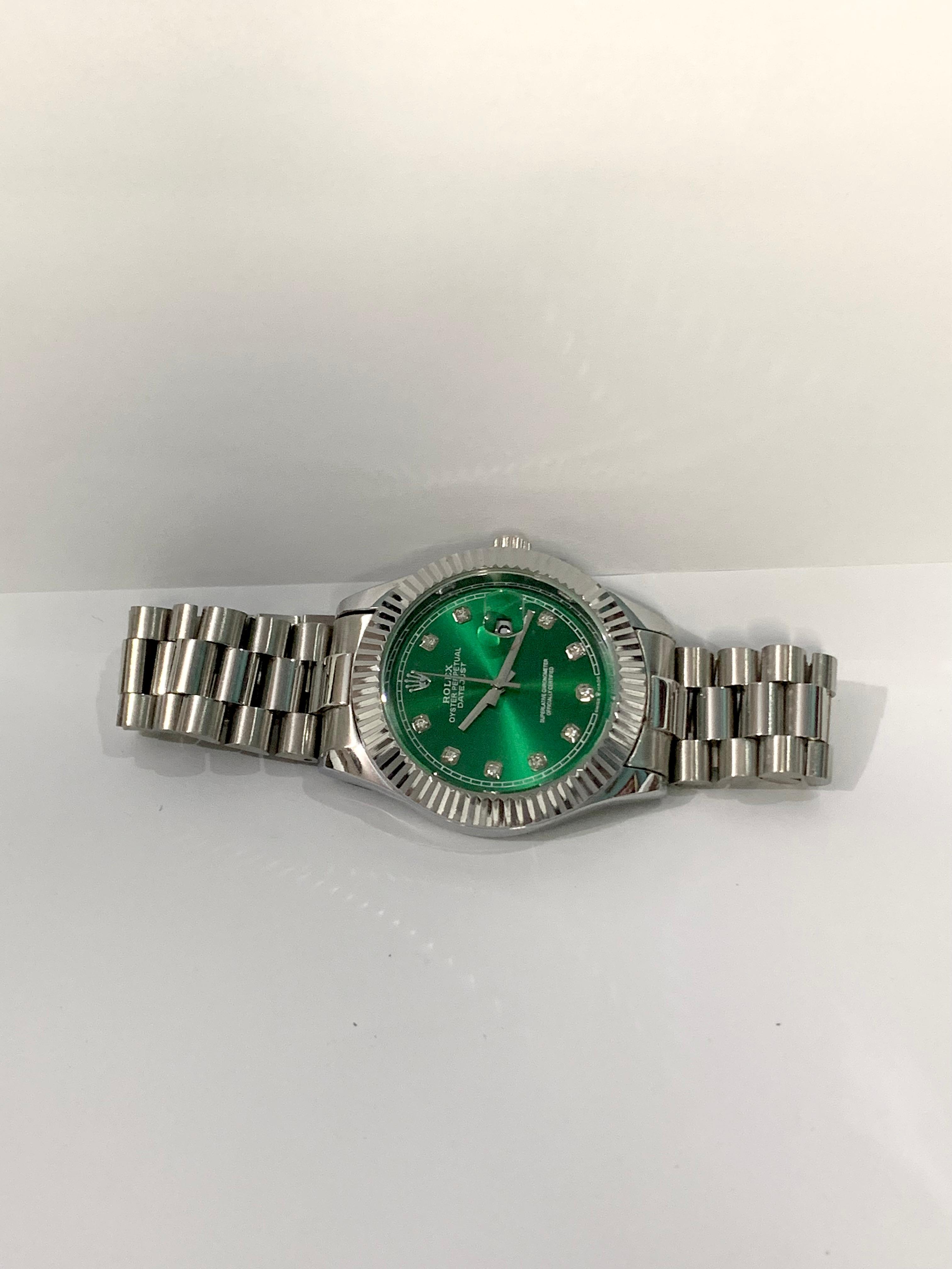Rolex Green Date Dial